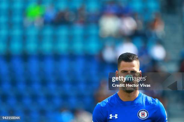 Edgar Mendez of Cruz Azul wears a blue nose supporting autism disease prior the 14th round match between Cruz Azul and Lobos BUAP at Azul Stadium on...