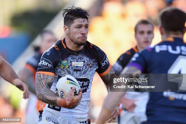 Malakai Watene-Zelezniak of the Tigers charges forward during the round five NRL match between the Wests Tigers and the Melbourne Storm at Mt Smart...