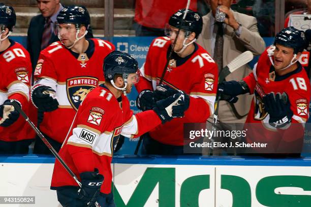 Jonathan Huberdeau of the Florida Panthers celebrates his first period goal with teammates against the Buffalo Sabres at the BB&T Center on April 7,...