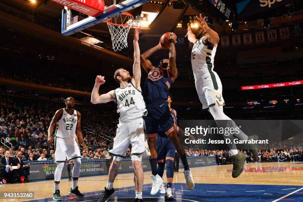 Kyle O'Quinn of the New York Knicks goes to the basket against the Milwaukee Bucks on April 7, 2018 at Madison Square Garden in New York City, New...