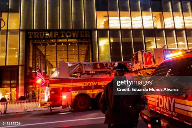 Officers and first responders assess the scene of a fire at Trump Tower on April 7, 2018 in New York City. One person has reportedly died and four...