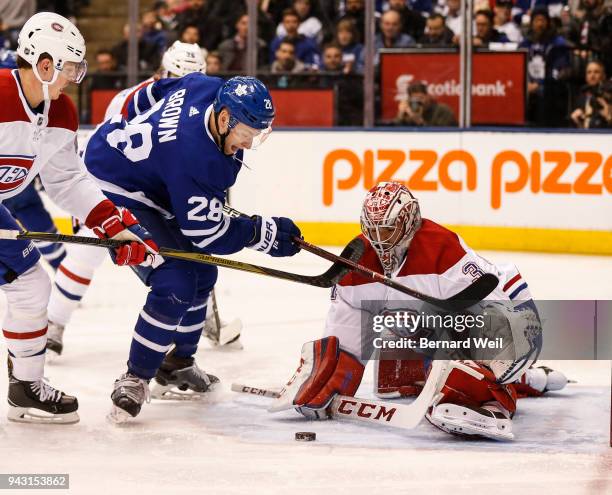 Toronto Maple Leafs right wing Connor Brown fans the puck in front of Montreal Canadiens goaltender Carey Price in the 1st period as the Toronto...