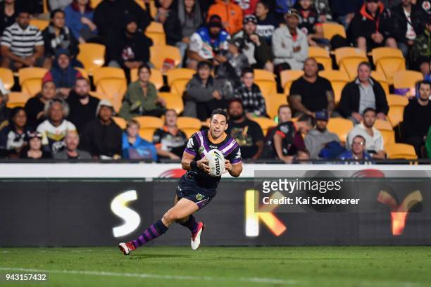 Billy Slater of the Storm charges forward during the round five NRL match between the Wests Tigers and the Melbourne Storm at Mt Smart Stadium on...