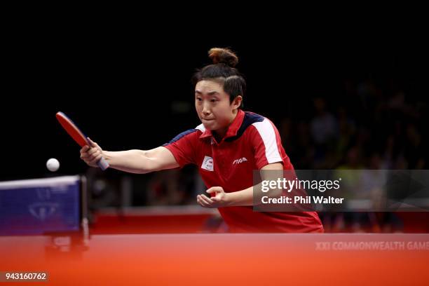 Tianwei Feng of Singapore in action in her Womens Team match against Melissa Tapper of Australia during Table Tennis on day four of the Gold Coast...