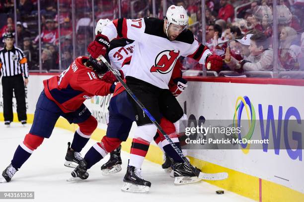 Patrick Maroon of the New Jersey Devils battles for the puck in the second period against the Washington Capitals at Capital One Arena on April 7,...