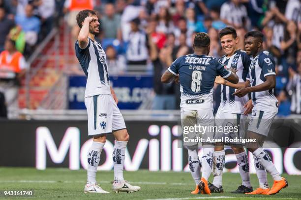 Jose Maria Basanta of Monterrey celebrates with teammates after scoring his teams second goal during the 14th round match between Monterrey and Pumas...