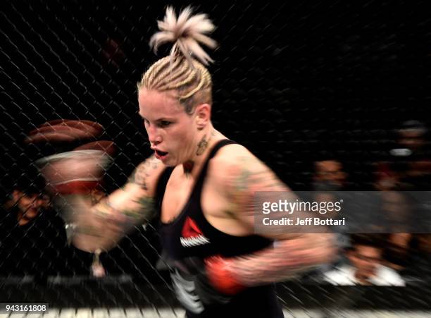 Bec Rawlings of Australia battles Ashlee Evans-Smith in their women's flyweight bout during the UFC 223 event inside Barclays Center on April 7, 2018...