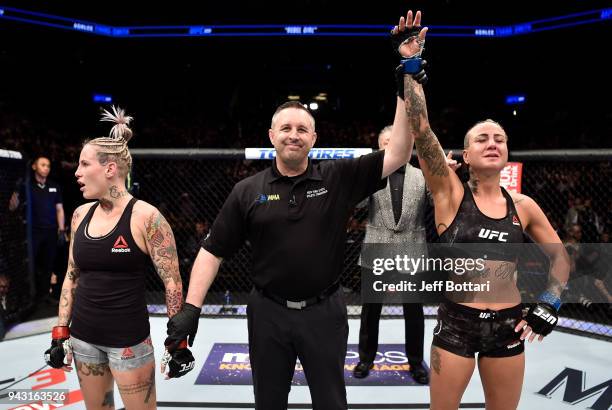 Ashlee Evans-Smith celebrates after her victory over Bec Rawlings of Australia in their women's flyweight bout during the UFC 223 event inside...