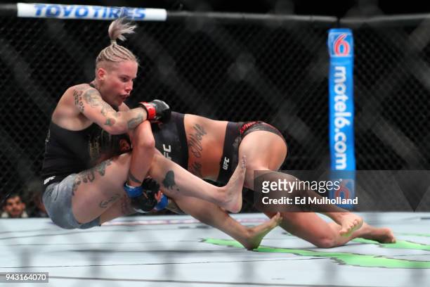 Ashlee Evans-Smith takes down Bec Rawlings during their flyweight bout at UFC 223 at Barclays Center on April 7, 2018 in New York City.