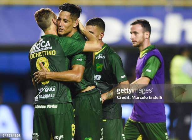Fernando Marquez of Defensa y Justicia celebrates with teammate Tomas Pochettino after winning a match against Boca Juniors for the first time ever...