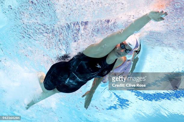 Penny Oleksiak of Canada competes during the Women's 100m Freestyle Heat 3 on day four of the Gold Coast 2018 Commonwealth Games at Optus Aquatic...