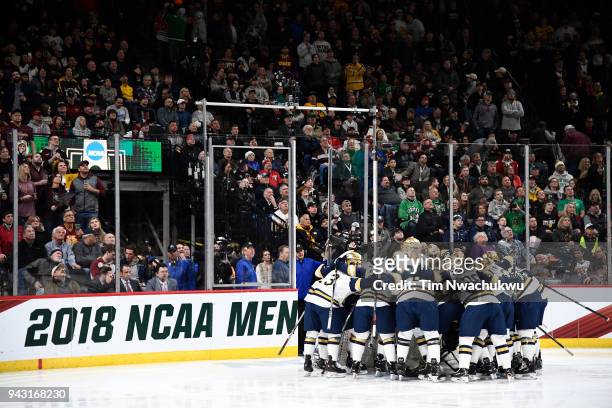 The Notre Dame Fighting Irish prepare to take on the Minnesota-Duluth Bulldogs during the Division I Men's Ice Hockey Semifinals held at the Xcel...