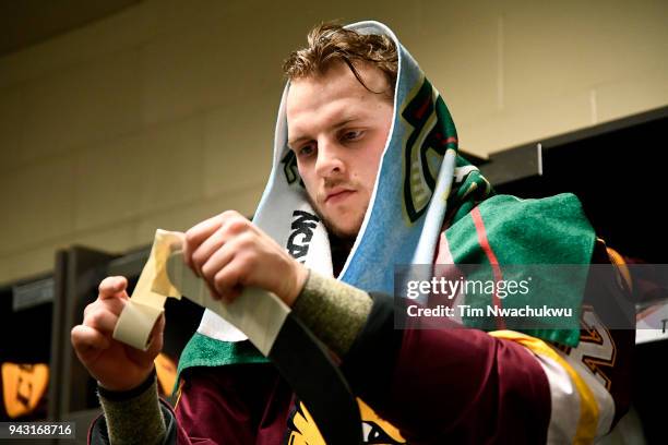 Jared Thomas of the Minnesota-Duluth Bulldogs prepares to take on the Notre Dame Fighting Irish during the Division I Men's Ice Hockey Semifinals...