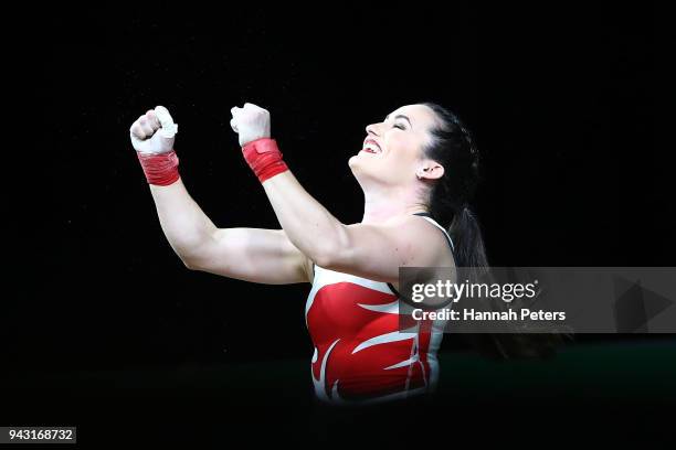Sarah Davies of England celebrates a lift during the Women's 69kg final during Weightlifting on day four of the Gold Coast 2018 Commonwealth Games at...