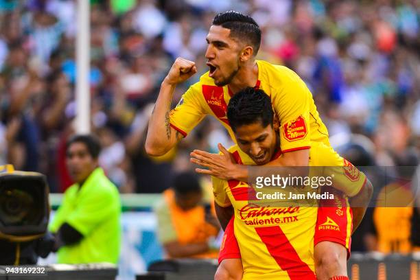Raul Ruidiaz of Morelia celebrates with teammates after scoring the second goal of his team, during the 14th round match between Leon and Morelia as...
