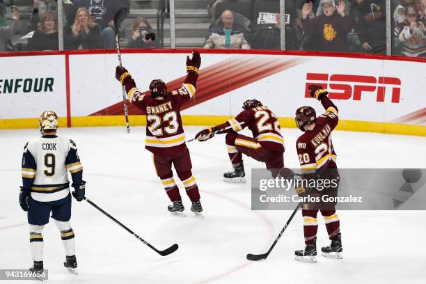 Jared Thomas of the Minnesota-Duluth Bulldogs celebrates his goal against the Notre Dame Fighting Irish during the Division I Men's Ice Hockey...