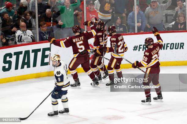 Jared Thomas of the Minnesota-Duluth Bulldogs celebrates his goal against the Notre Dame Fighting Irish during the Division I Men's Ice Hockey...