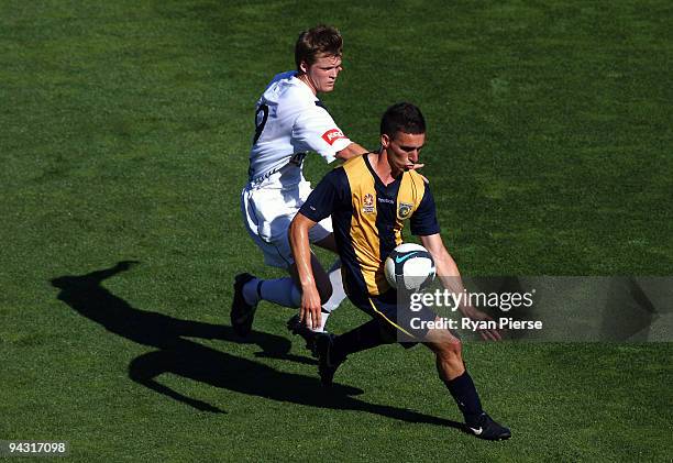 Nikas Panagiotis of the Mariners controls the ball ahead of Craig Sweeney of the Victory during the round 14 National Youth League match between the...