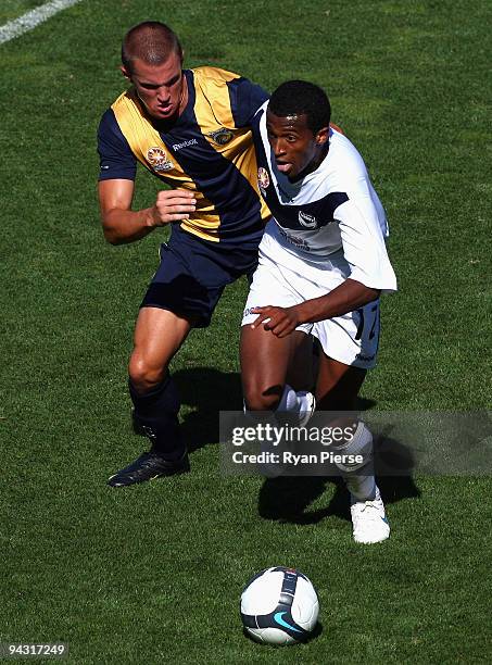 Emmanuel Giannaros of the Mariners tackles Tedros Yabio of the Victory during the round 14 National Youth League match between the Central Coast...