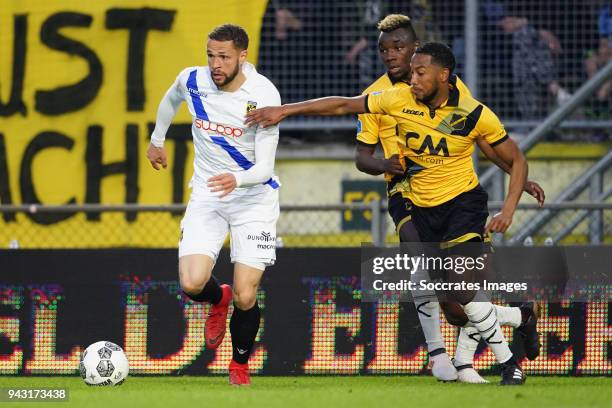 Luc Castaignos of Vitesse, Thierry Ambrose of NAC Breda, Fabian Sporkslede of NAC Breda during the Dutch Eredivisie match between NAC Breda v Vitesse...