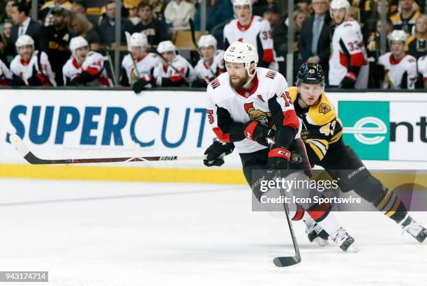 Ottawa Senators center Zack Smith turns away from Boston Bruins left wing Danton Heinan during a game between the Boston Bruins and the Ottawa...