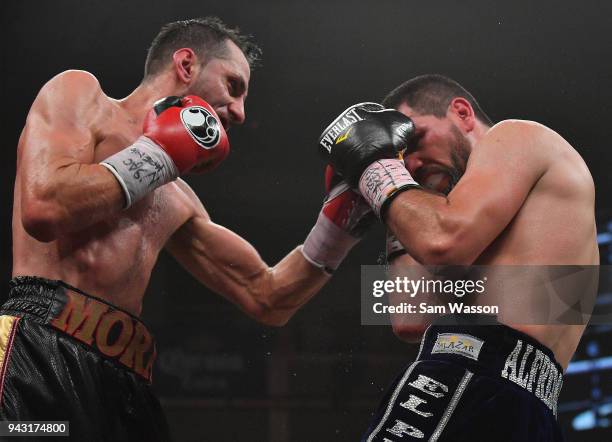 Sergio Mora throws a left at Alfredo Angulo during their super middleweight bout at The Joint inside the Hard Rock Hotel & Casino on April 7, 2018 in...