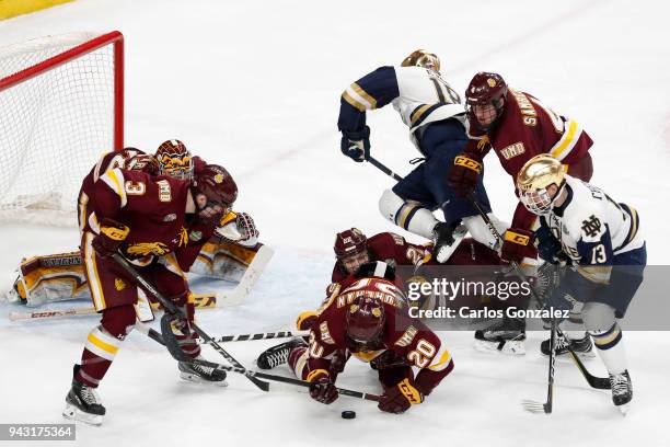 Karson Kuhlman of the Minnesota-Duluth Bulldogs and his teammates clog up the middle against the Notre Dame Fighting Irish during the Division I...