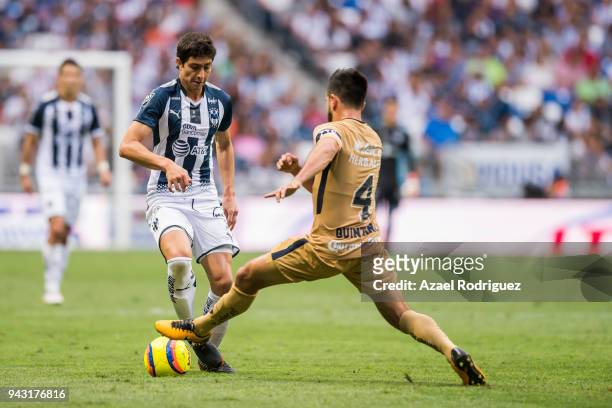 Stefan Medina of Monterrey fights for the ball with Luis Quintana of Pumas during the 14th round match between Monterrey and Pumas UNAM as part of...