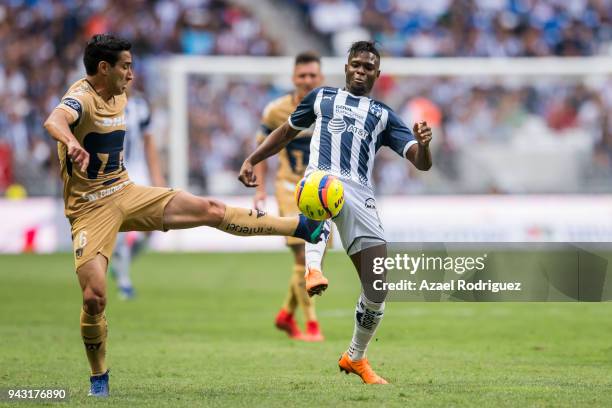 Aviles Hurtado of Monterrey fights for the ball with Luis Fuentes of Pumas during the 14th round match between Monterrey and Pumas UNAM as part of...