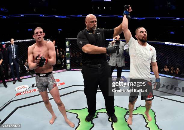 Chris Gruetzemacher celebrates after his TKO victory over Joe Lauzon in their lightweight bout during the UFC 223 event inside Barclays Center on...