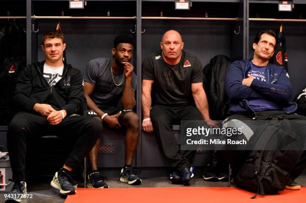 Al Iaquinta relaxes with his team in his locker room prior to his bout against Khabib Nurmagomedov of Russia during the UFC 223 event inside Barclays...