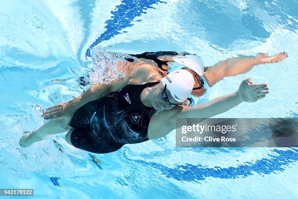 Penny Oleksiak of Canada competes during the Women's 100m Freestyle Heat 3 on day four of the Gold Coast 2018 Commonwealth Games at Optus Aquatic...