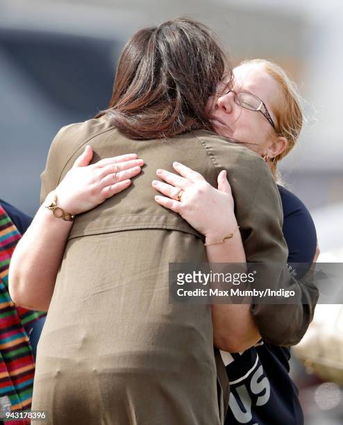 Meghan Markle hugs an athlete as she attends the UK Team Trials for the Invictus Games Sydney 2018 at the University of Bath on April 6, 2018 in...