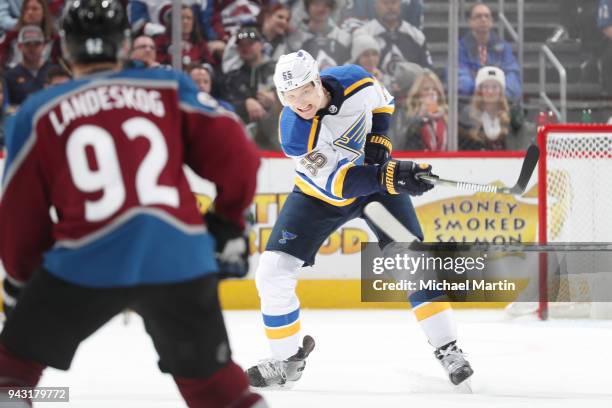 Colton Parayko of the St. Louis Blues passes the puck against the Colorado Avalanche at the Pepsi Center on April 2018 in Denver, Colorado.