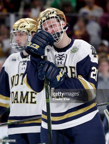 Joe Wegwerth of the Notre Dame Fighting Irish reacts to the loss to the Minnesota-Duluth Bulldogs during the championship game of the 2018 NCAA...