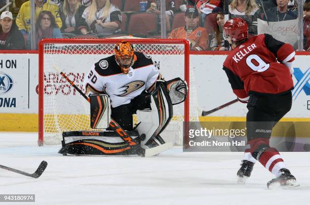 Goalie Ryan Miller of the Anaheim Ducks makes a save on the shot by Clayton Keller of the Arizona Coyotes during second period at Gila River Arena on...