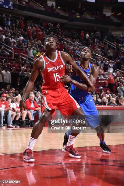 Clint Capela of the Houston Rockets and Jerami Grant of the Oklahoma City Thunder wait for the ball on April 7, 2018 at the Toyota Center in Houston,...