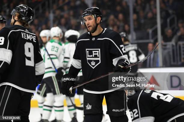 Adrian Kempe and Alec Martinez of the Los Angeles Kings look on after Jamie Benn of the Dallas Stars scored a goal during the first period of a game...