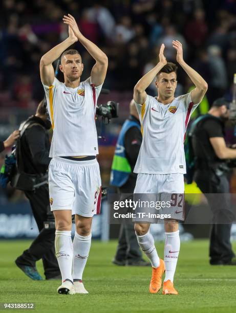 Edin Dzeko and Stephan El Shaarawy of Roma farewell after the UEFA Champions League Quarter-Final first leg match between FC Barcelona and AS Roma at...