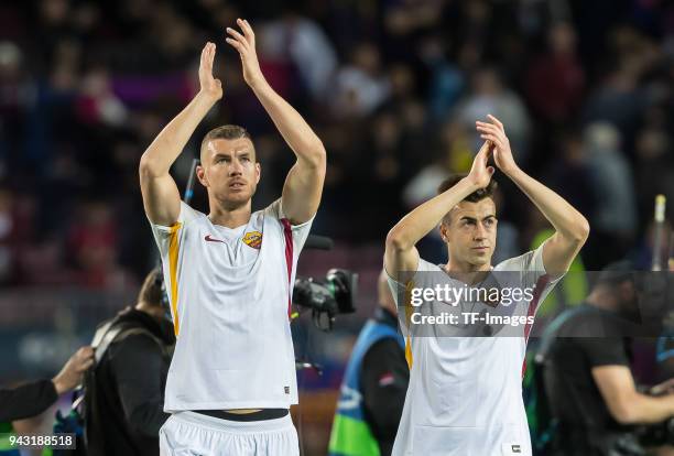 Edin Dzeko and Stephan El Shaarawy of Roma farewell after the UEFA Champions League Quarter-Final first leg match between FC Barcelona and AS Roma at...