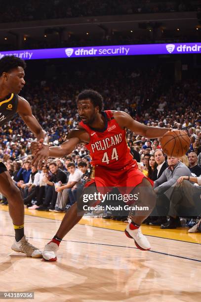 Solomon Hill of the New Orleans Pelicans handles the ball against the Golden State Warriors on April 7, 2018 at ORACLE Arena in Oakland, California....