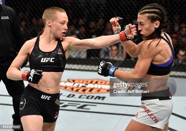 Rose Namajunas punches Joanna Jedrzejczyk of Poland in their women's strawweight title bout during the UFC 223 event inside Barclays Center on April...