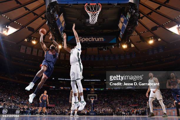 Kyle O'Quinn of the New York Knicks goes to the basket against the Milwaukee Bucks on April 7, 2018 at Madison Square Garden in New York City, New...