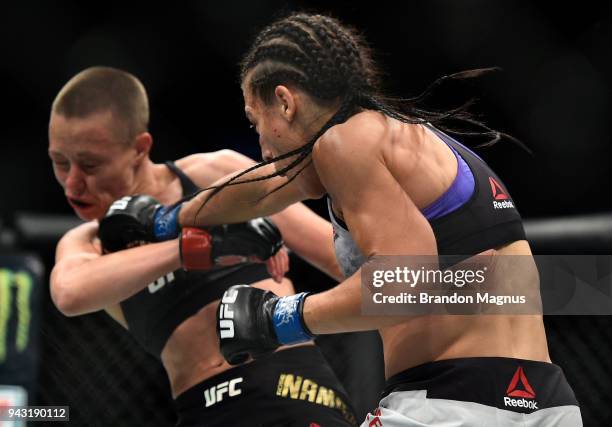 Joanna Jedrzejczyk of Poland punches Rose Namajunas in their women's strawweight title bout during the UFC 223 event inside Barclays Center on April...
