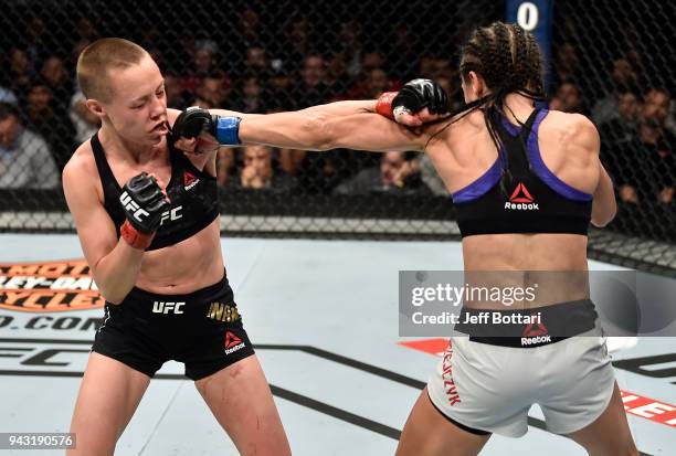 Joanna Jedrzejczyk of Poland punches Rose Namajunas in their women's strawweight title bout during the UFC 223 event inside Barclays Center on April...