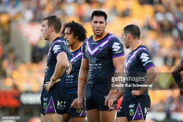 Nelson Asofa-Solomona of the Storm and his team mates react during the round five NRL match between the Wests Tigers and the Melbourne Storm at Mt...