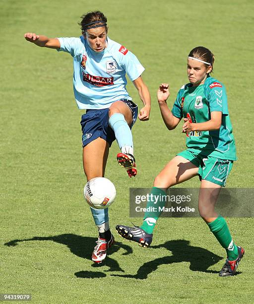 Julie Rydahl of Sydney FC and Kahlia Hogg of Canberra United compete for the ball during the W-League Semi Final match between Sydney FC and Canberra...