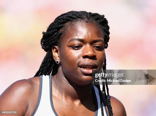 Asha Philip of England looks on after she competes in the Women's 100 metres heats on day four of the Gold Coast 2018 Commonwealth Games at Carrara...