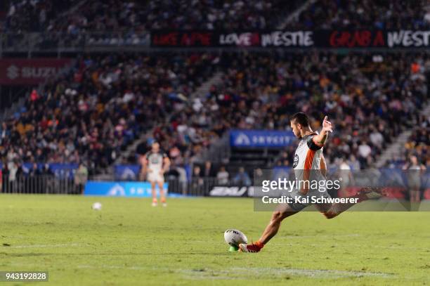 Tuimoala Lolohea of the Tigers kicks a conversion during the round five NRL match between the Wests Tigers and the Melbourne Storm at Mt Smart...