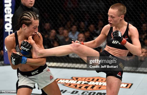 Rose Namajunas kicks Joanna Jedrzejczyk of Poland in their women's strawweight title bout during the UFC 223 event inside Barclays Center on April 7,...